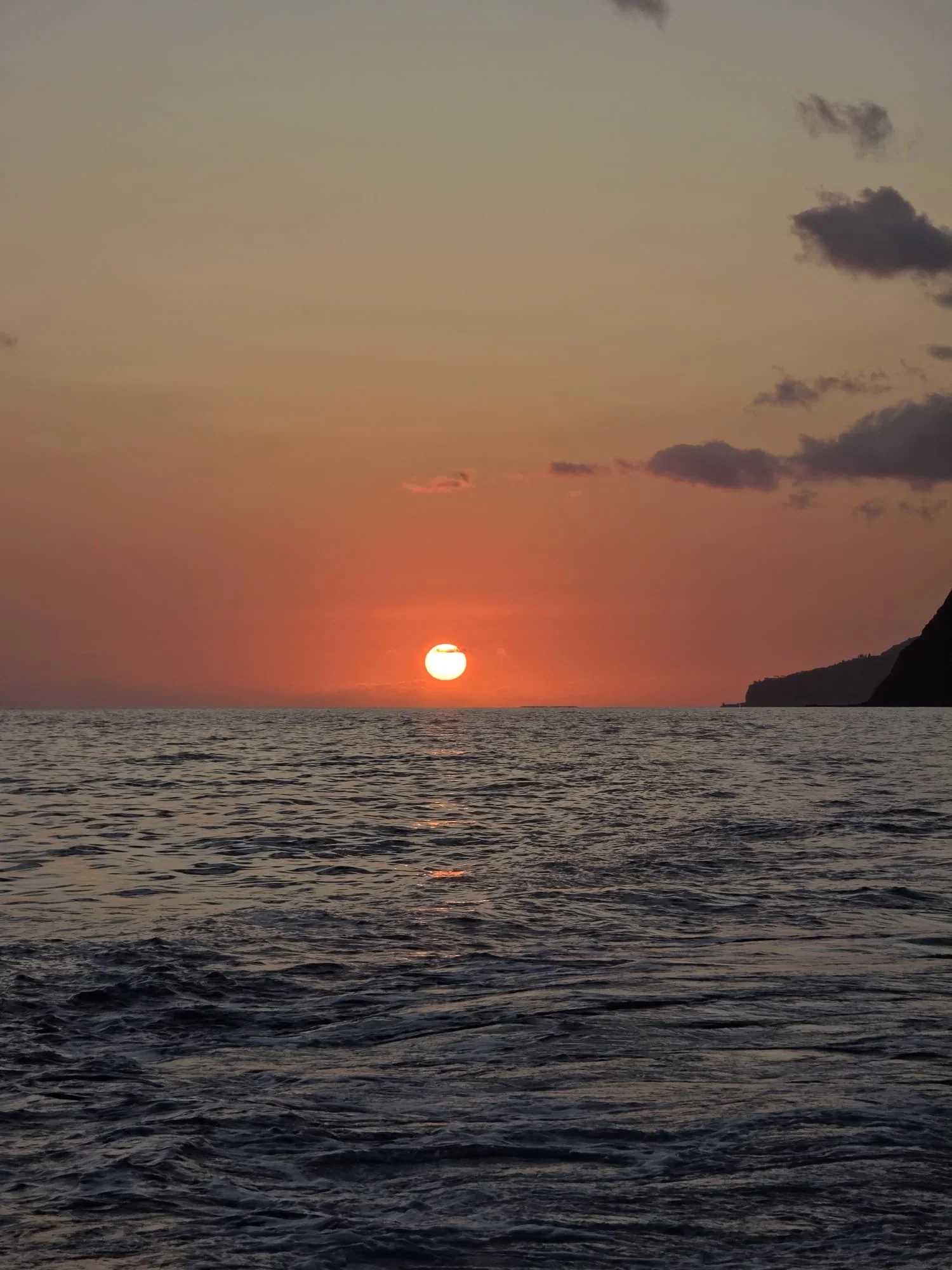 Sunset over the Atlantic during a private boat tour